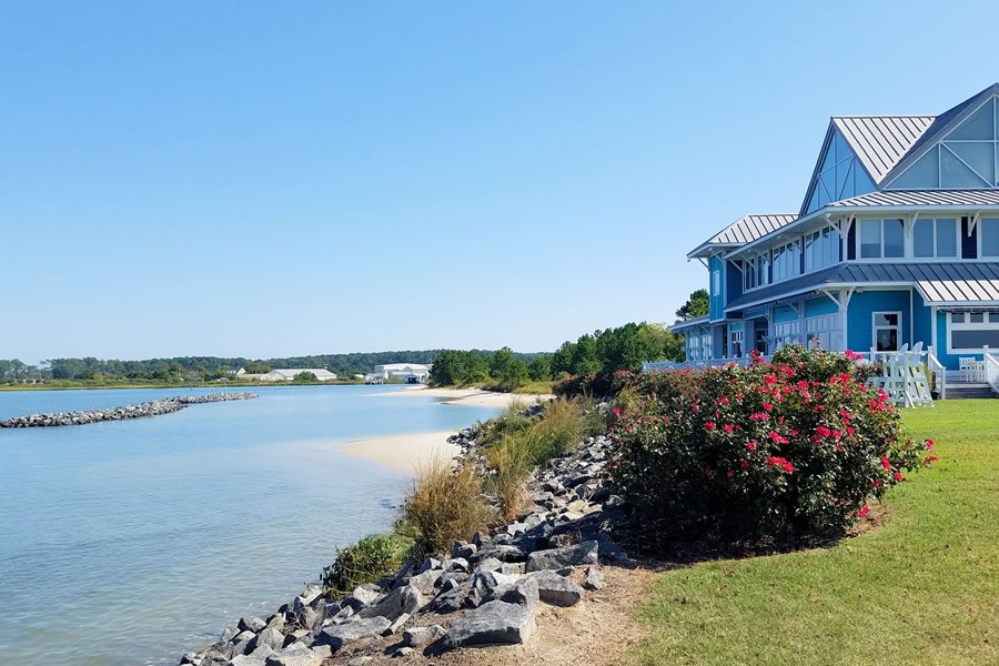 money goals with a beach house overlooking a cove 