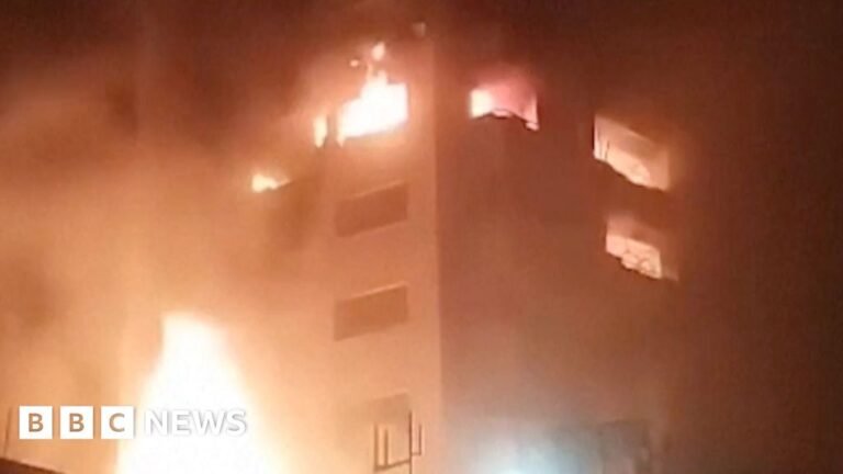 Footage shows explosions and buildings ablaze in Iran