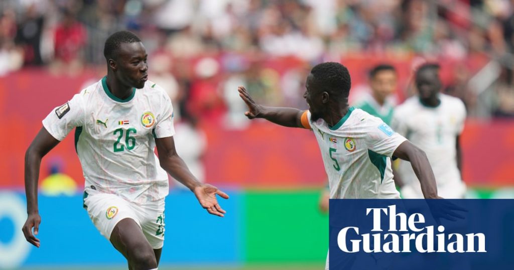 Senegal salvage hopes of World Cup last-32 place with rout of 10-man Iraq