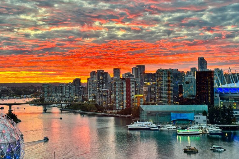 A sunset over False Creek, Vancouver, in September 2024. Image by Ted McGrath via Flickr (CC BY-NC-SA 2.0).