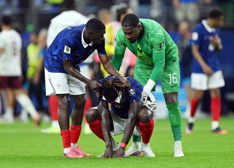 Ousmane Dembele, Manu Kone and Mike Maignan after the final whistle.