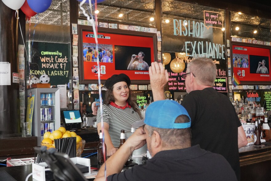 France fans watch the team take on Spain during the World Cup semifinal at Bishop Exchange on Bastille Day.