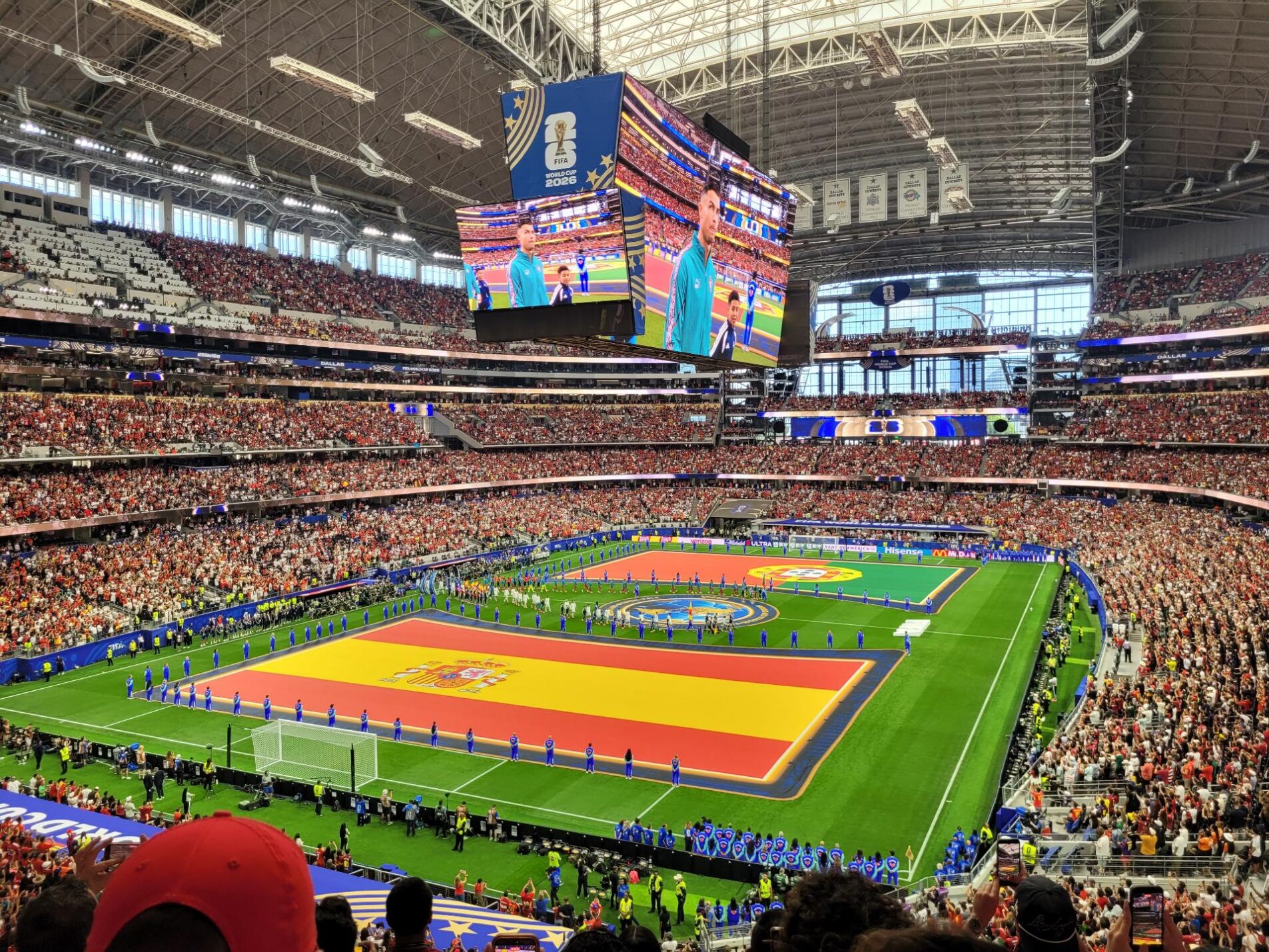 A full stadium before a soccer match.