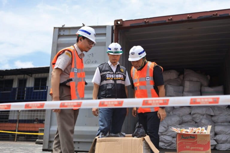 Tanjung Priok Customs officers inspect pangolin scales intended to be smuggled to Cambodia. Image courtesy of Tanjung Priok Customs.