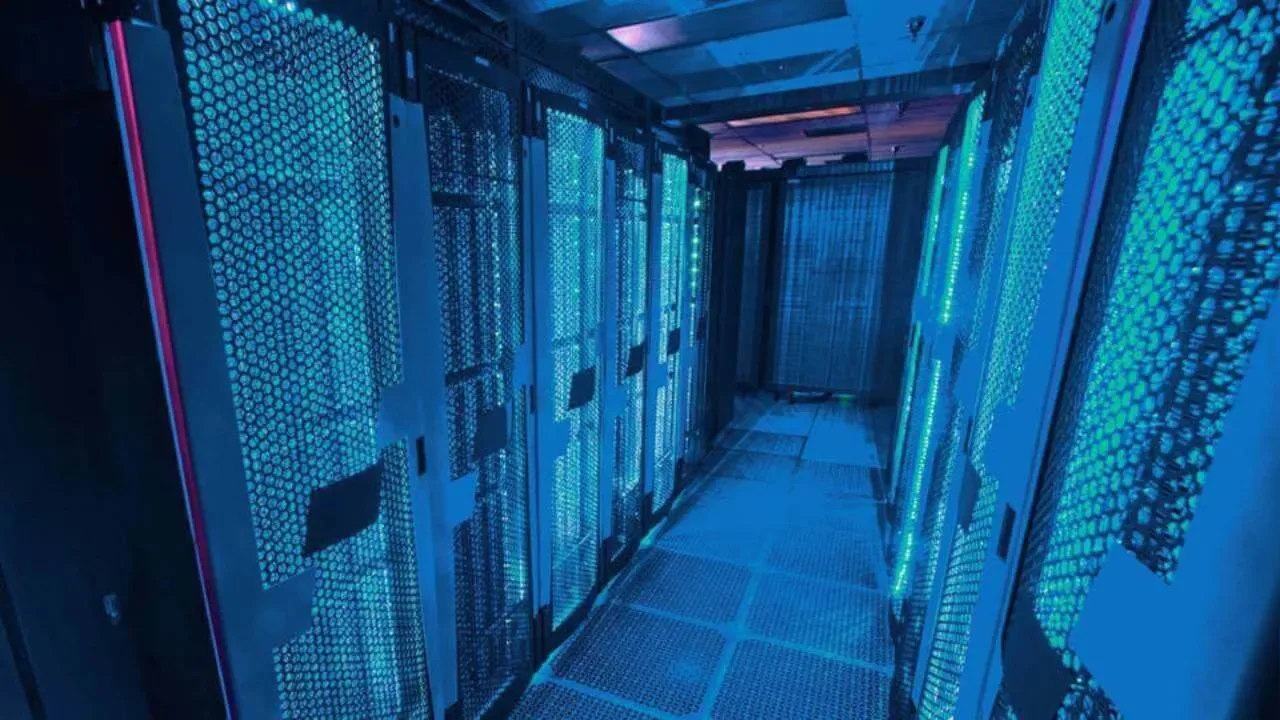 Data center racks with blue lights.