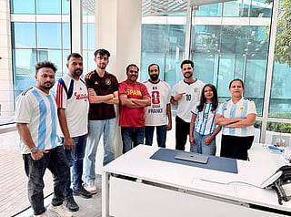"United by work, divided by teams. One office, many jerseys! Jersey day in our office on June 29, 2026."